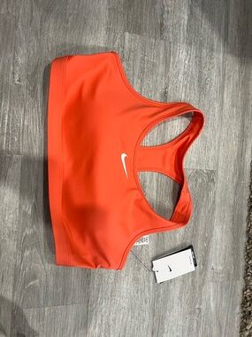 Nike Women's Orange Racerback Medium-Impact Sports Bra